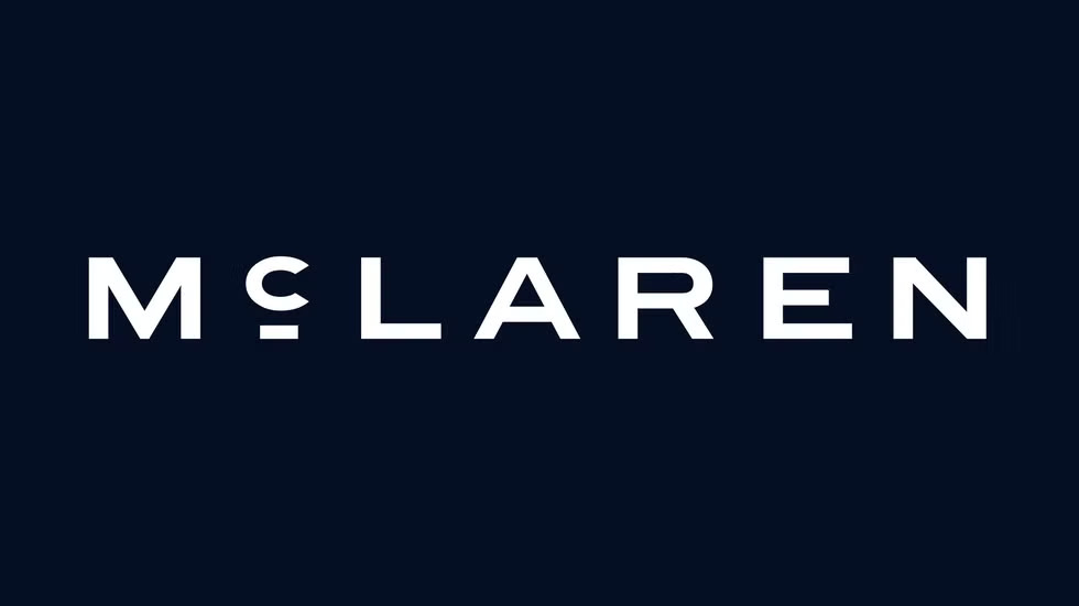 McLaren unveils its fresh new logo design. Featured Image