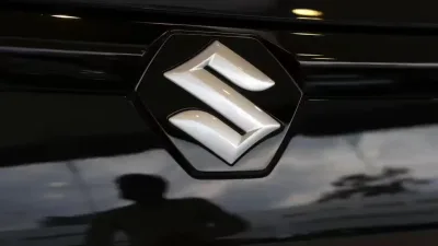 Maruti MD Takeuchi states that smaller EVs will be introduced once the charging infrastructure is prepared. Featured Image